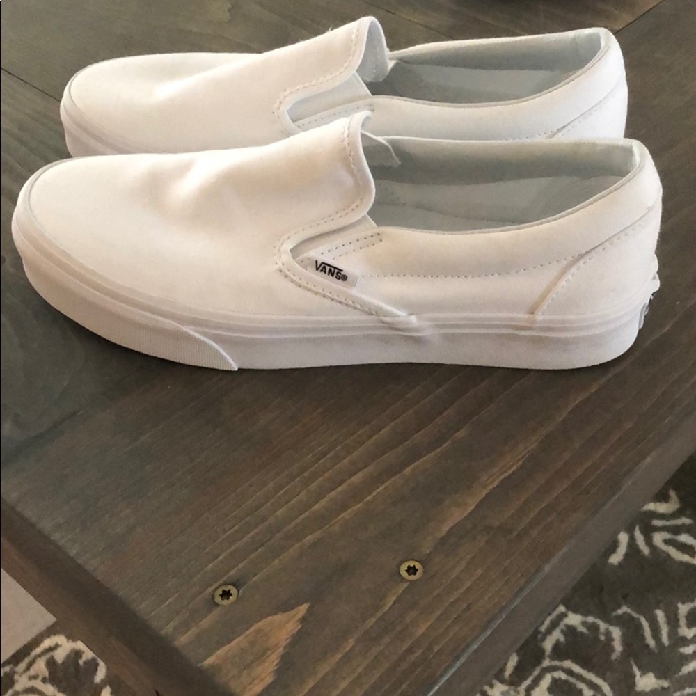 White slip on Vans